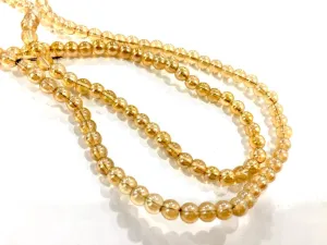 Golden Transparent Circular Glass Beads